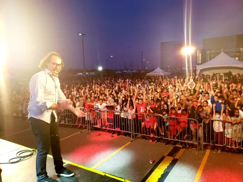 Mike D'Urzo performing on stage.