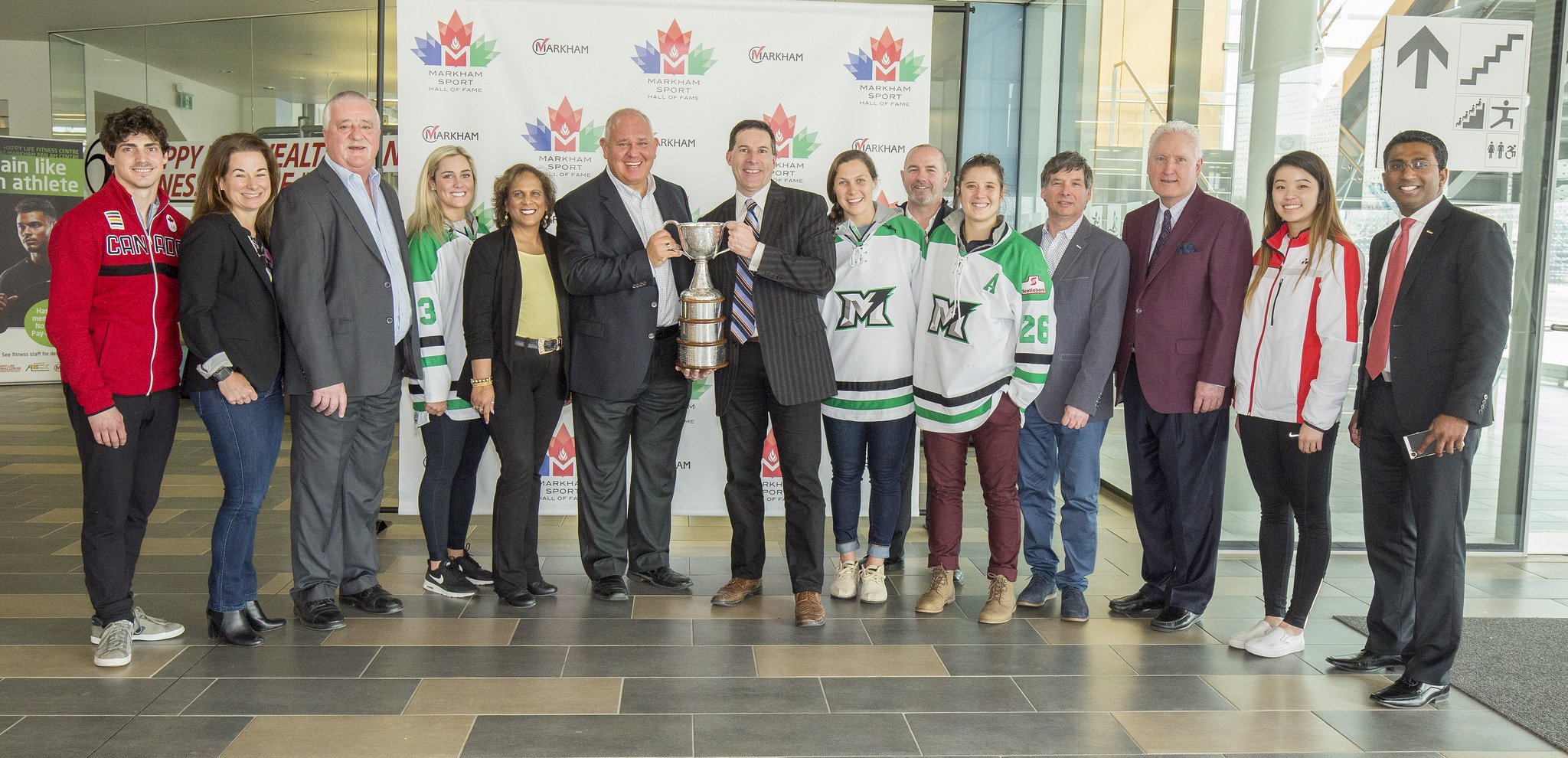 image of athletes with Mayor Frank Scarpitti